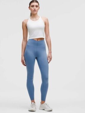 Lululemon super high rise glow up Leggings 
NWT MSRP $118 prep blue glow